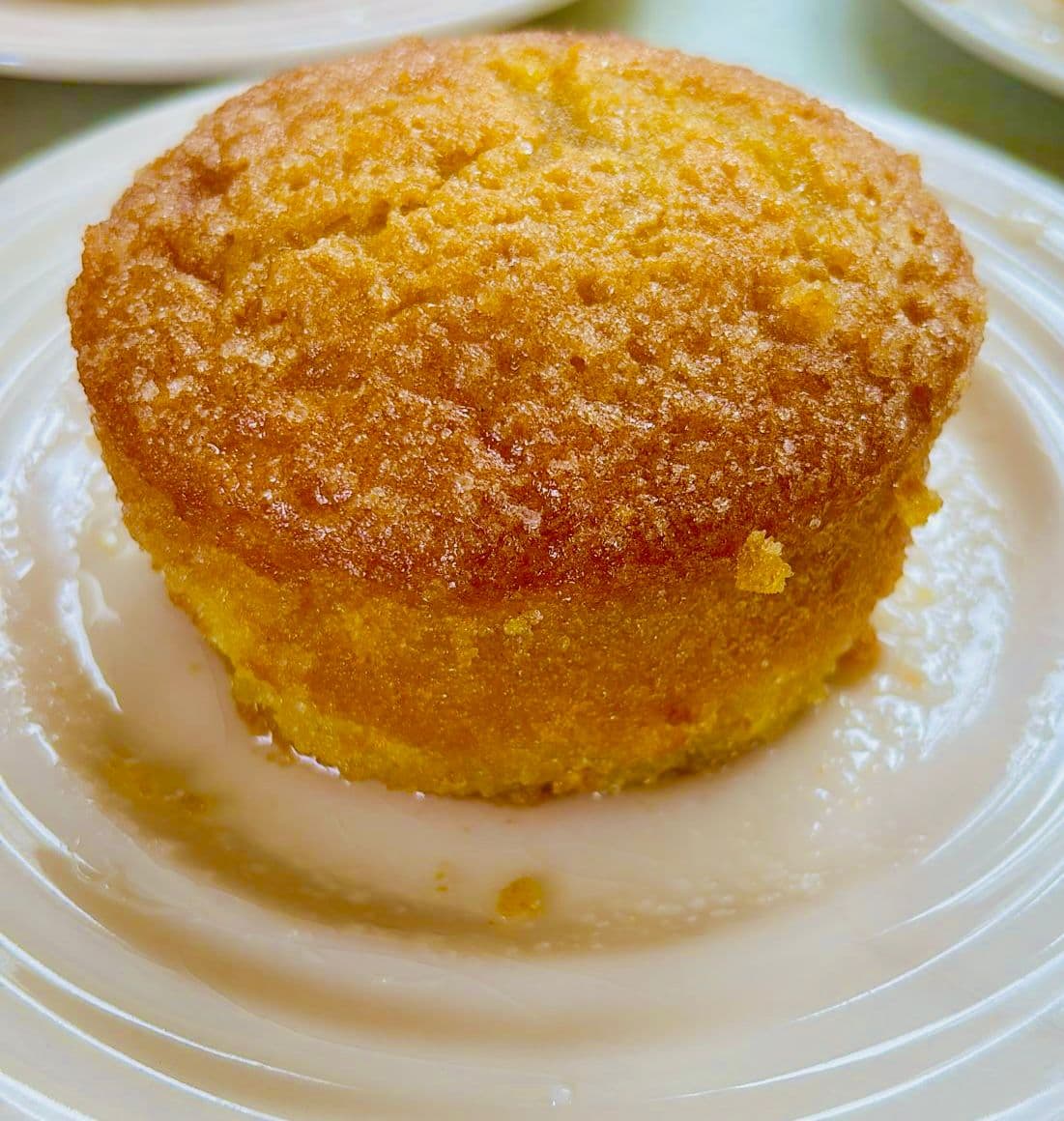 Munchkin Bakehouse 4-inch Lemon Drizzle Cake on a plate